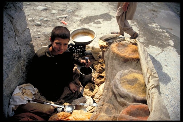A child spice seller, Gilgit, Northern Areas, Pakistan. Photo © Mark Mauchline.