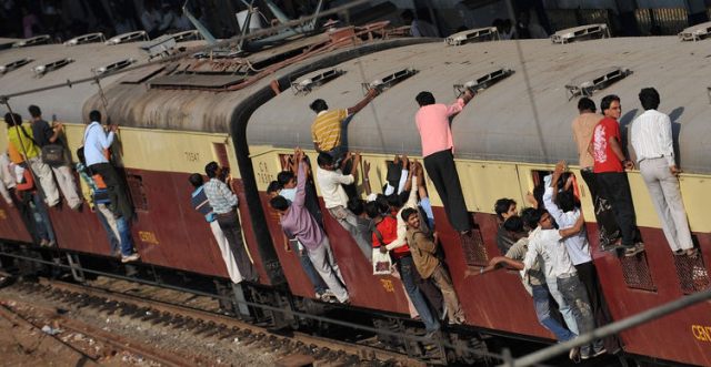 The term “standing room only”, taken to the extreme. Photo © Pal Pillan / AFP. 